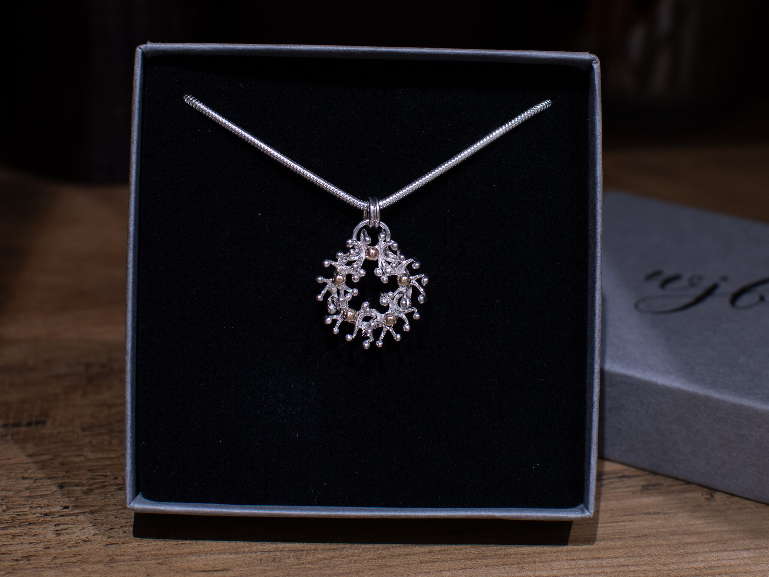 Sterling Silver and 9ct Gold Anemone Pendant in Box