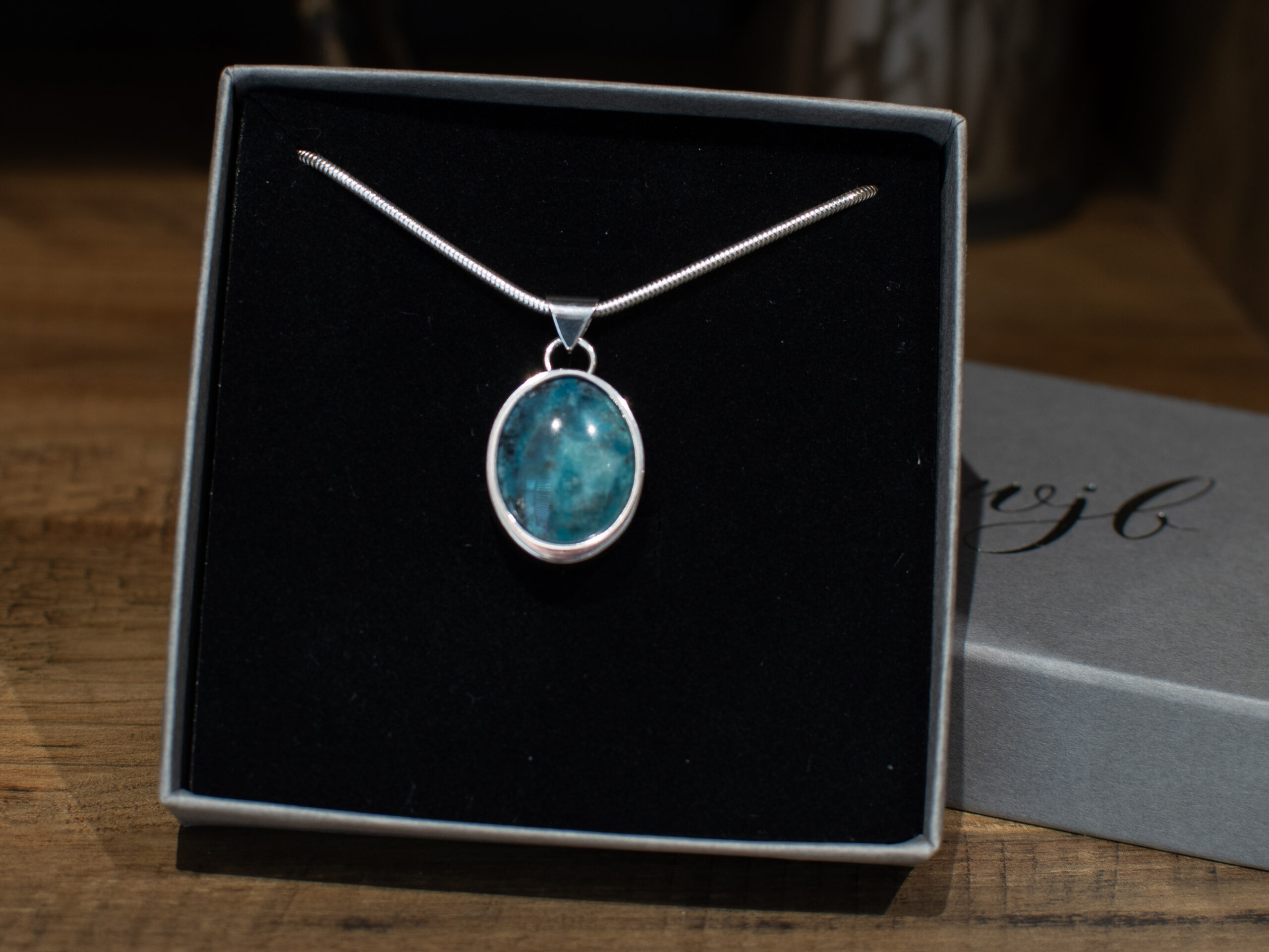 WBR-95-01-Product-Image-Etsy-Box Oval Blue Gem Silica Pendant - in box